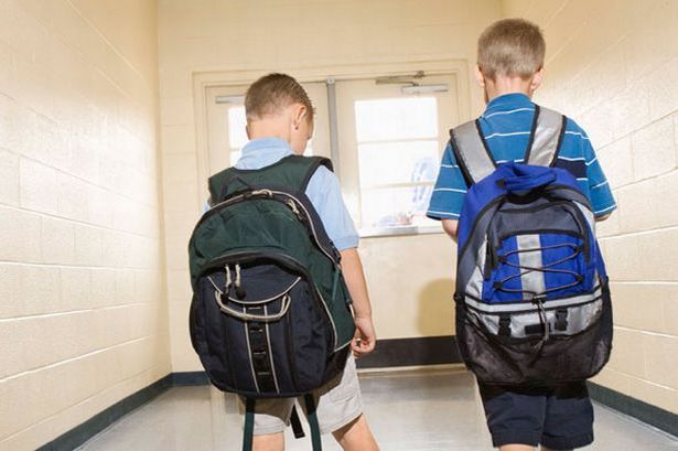 back-to-school-kids-wearing-backpacks-pic-getty-966574824